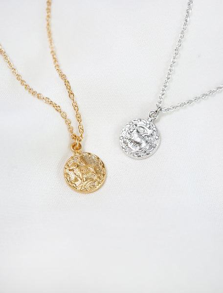 tiny horoscope necklace in gold and silver
