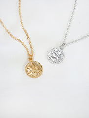 tiny horoscope necklace in gold and silver