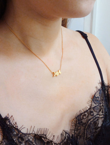 moon phase necklace modelled side view