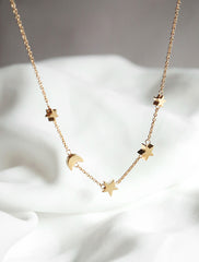 gold filled moon and stars necklace hanging