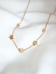 gold filled string of stars necklace
