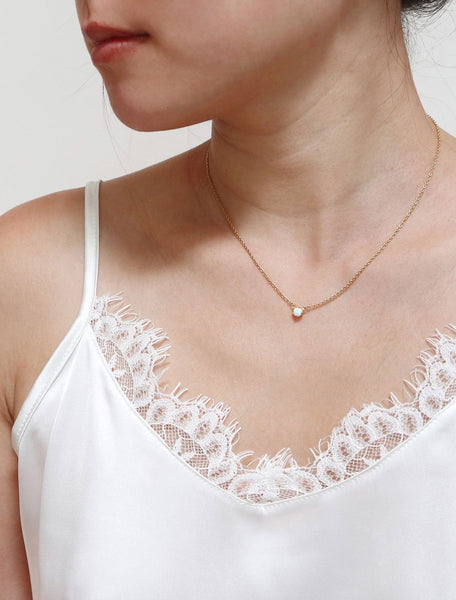 tiny opal necklace modelled