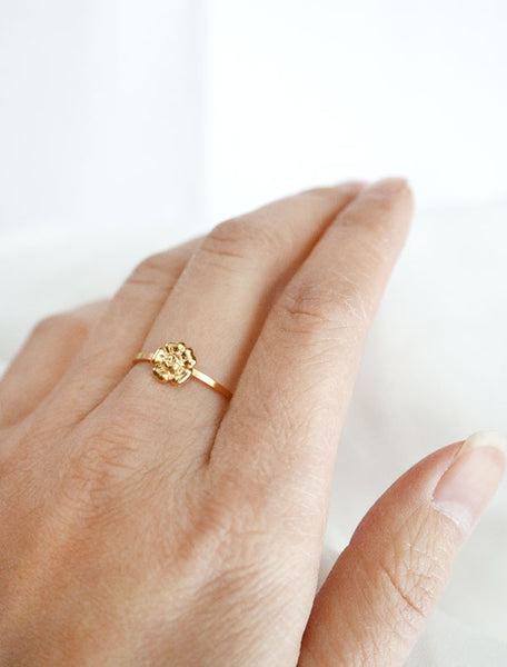 gold flower stacking ring worn