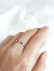 silver macro faceted ring worn