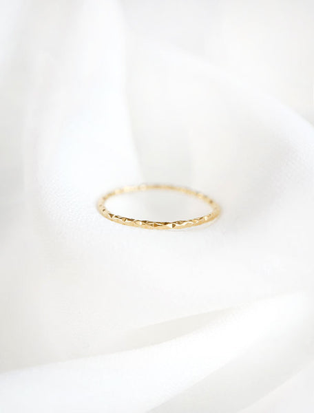 gold micro faceted ring band