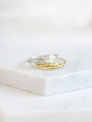 feather rings . set of 2