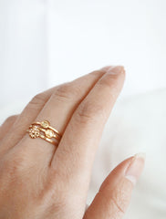 gold hippie stacking rings worn