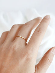 gold hexagon band worn