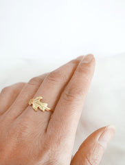 gold oak leaf ring worn