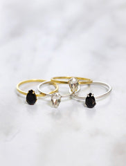 silver & gold crystal teardrop rings in black and clear