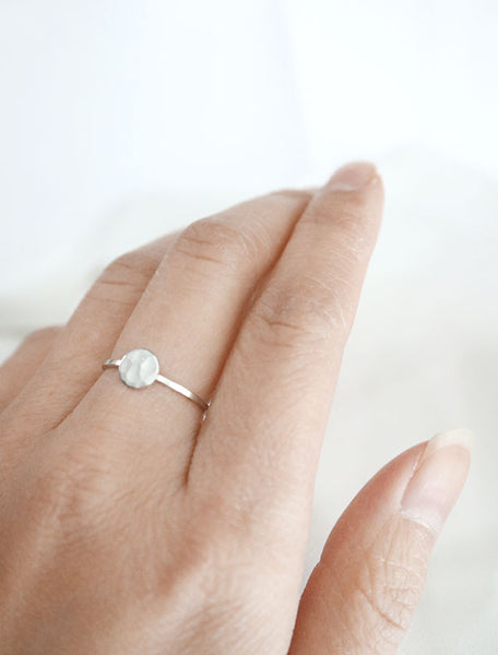 silver hammered circle ring worn
