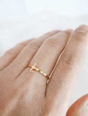 gold seahorse ring worn