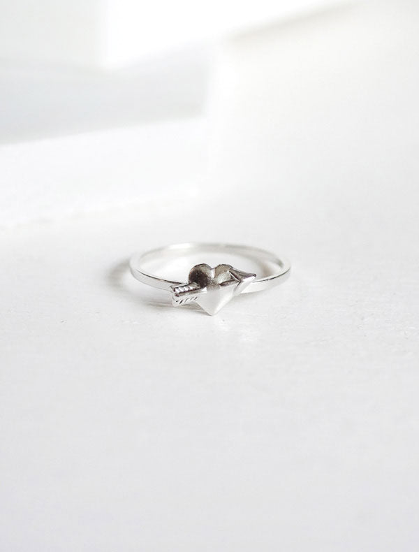 silver heart with arrow ring