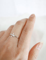 silver starfish ring worn