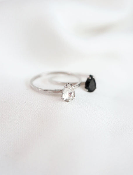 silver filled crystal teardrop rings in clear and black