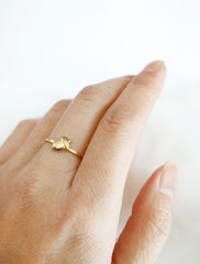 gold acorn ring worn