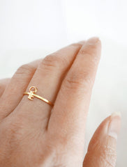 tiny gold key ring worn