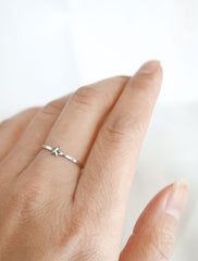 tiny silver star ring worn