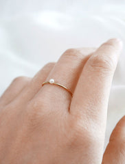gold genuine pearl ring worn
