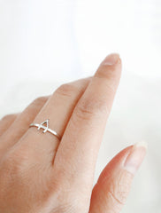 silver wishbone ring worn