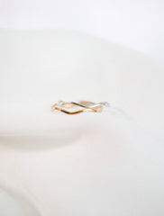 silver and gold wave rings